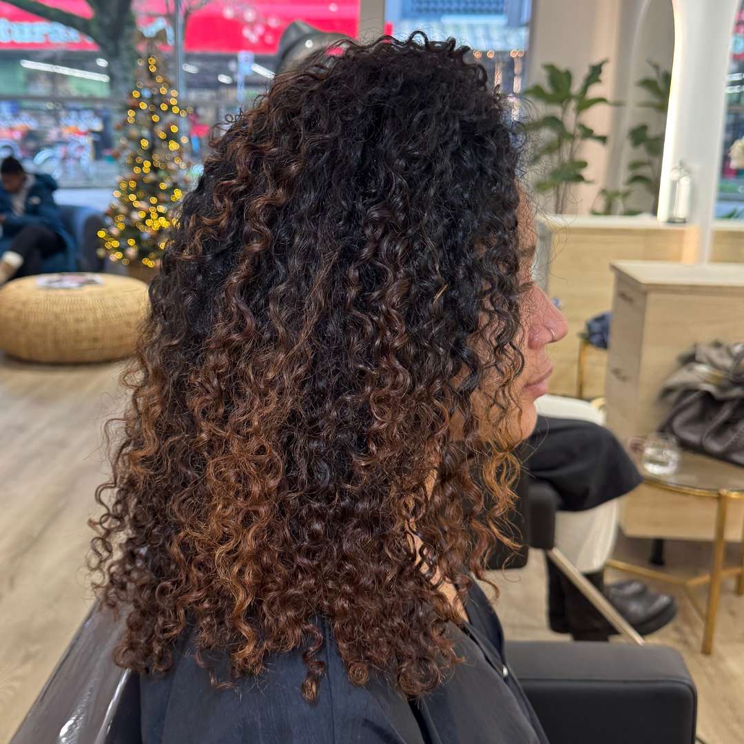 Deep scalp cleansing treatment at DesCurl Spa to reduce dryness and buildup.