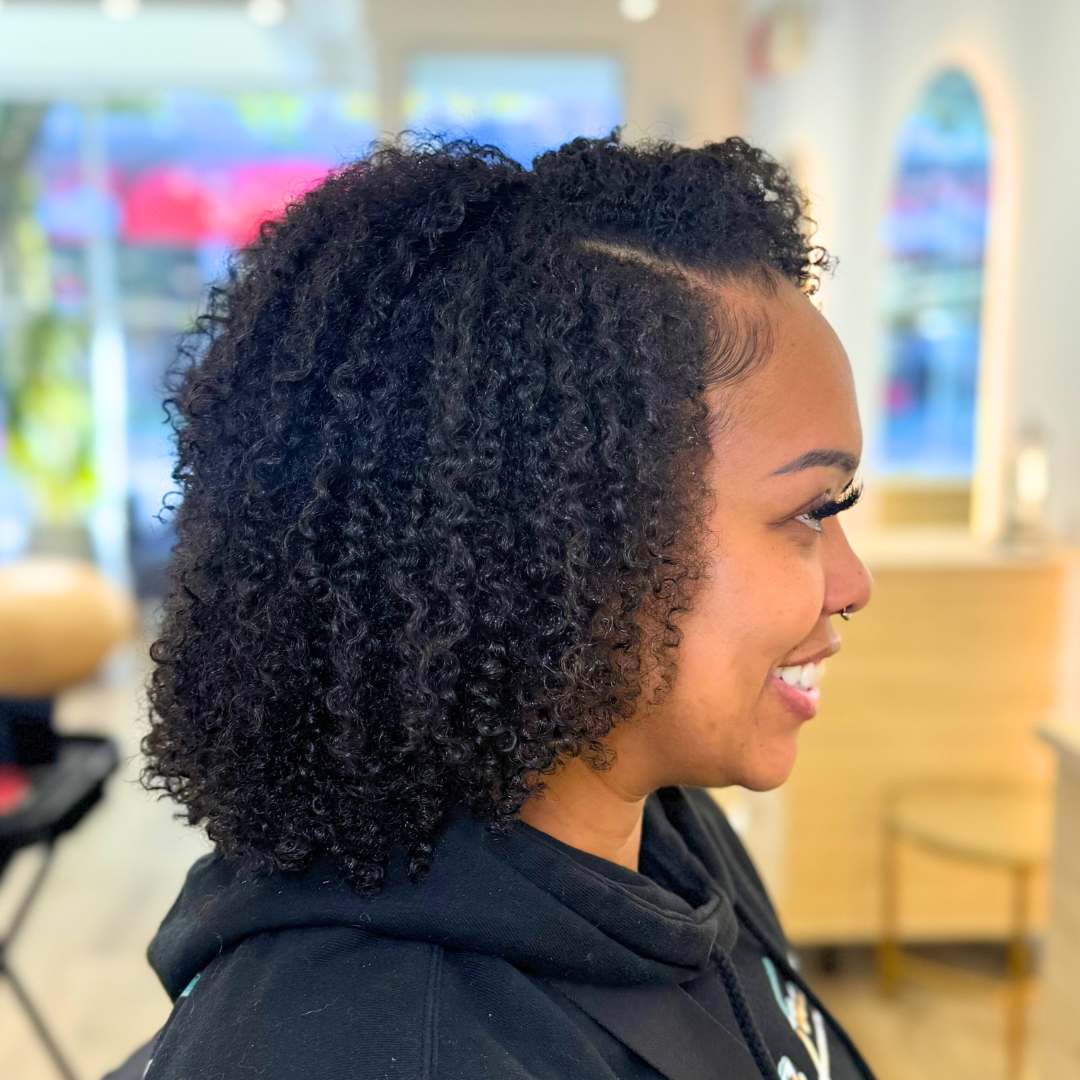 Curl styling service with professional products and techniques