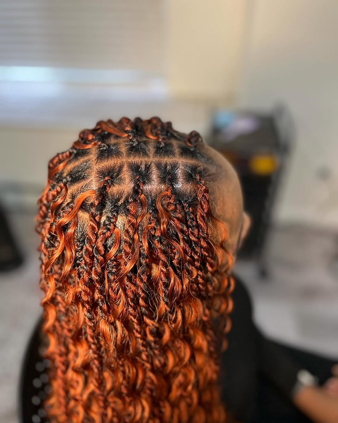 Woman with freshly defined natural curls at DES Curl Spa Salon