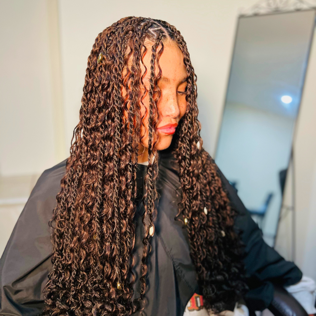 Boho knotless braids with curly ends styled by professional braider in Vancouver