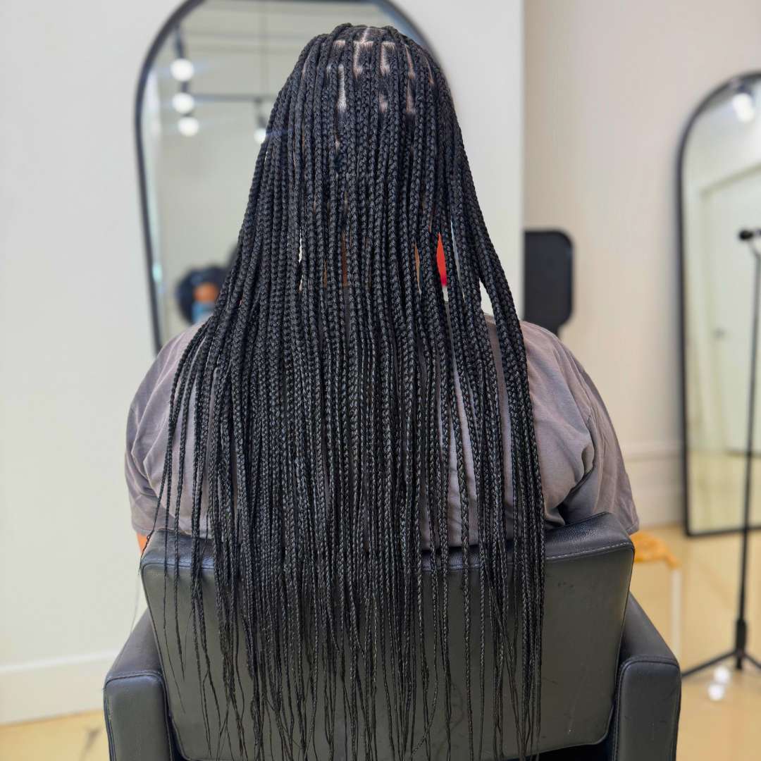 Knotless braids styled by Maya at Destini Curl Spa in Vancouver